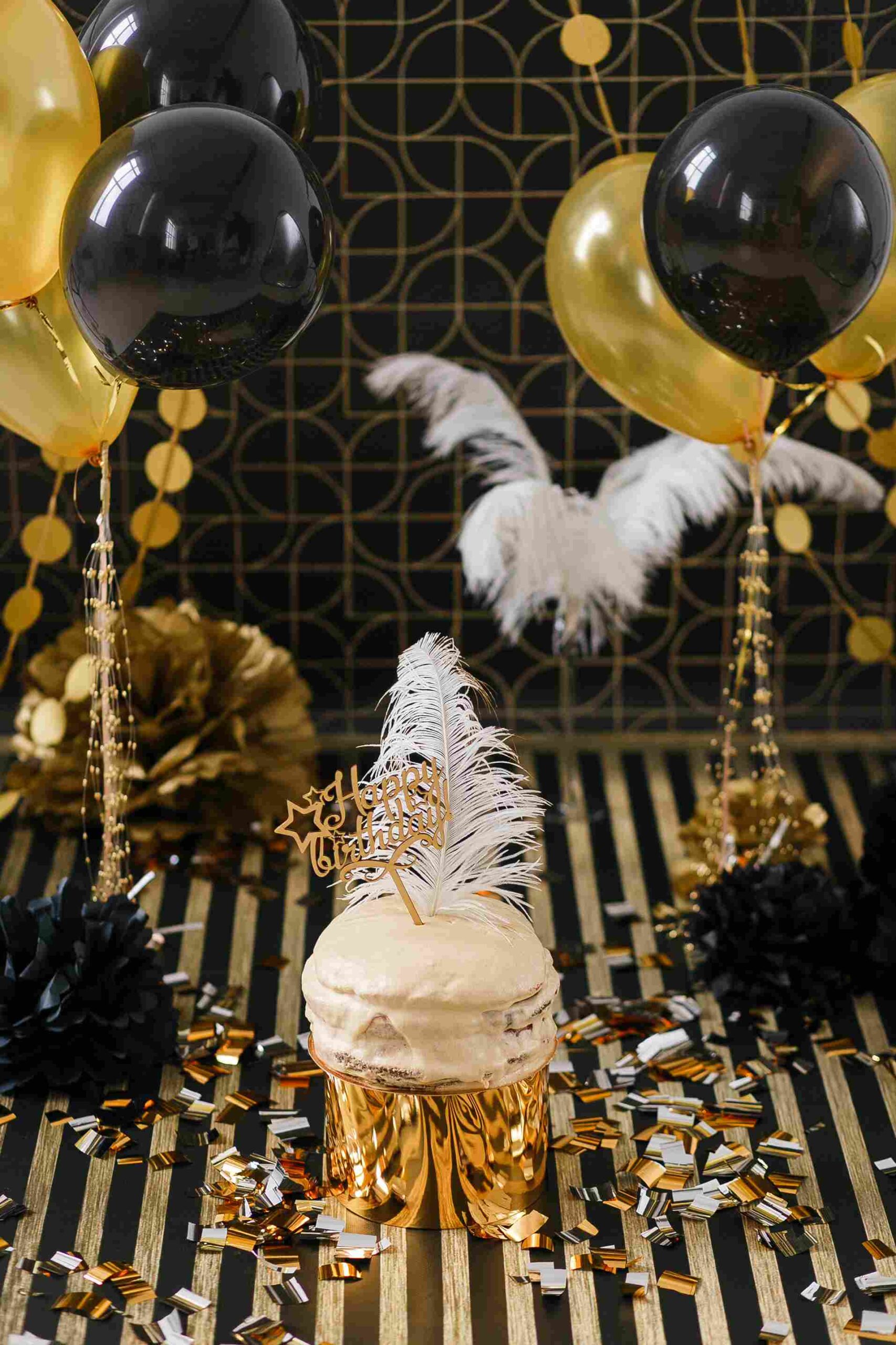 birthday-party-cake-with-golden-black-decor-various-balloons_11zon
